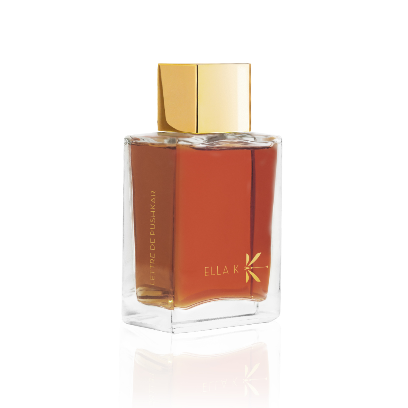 Flacon de parfum Lettre de Pushkar d’Ella K avec capuchon doré, vu de trois quarts sur fond blanc.