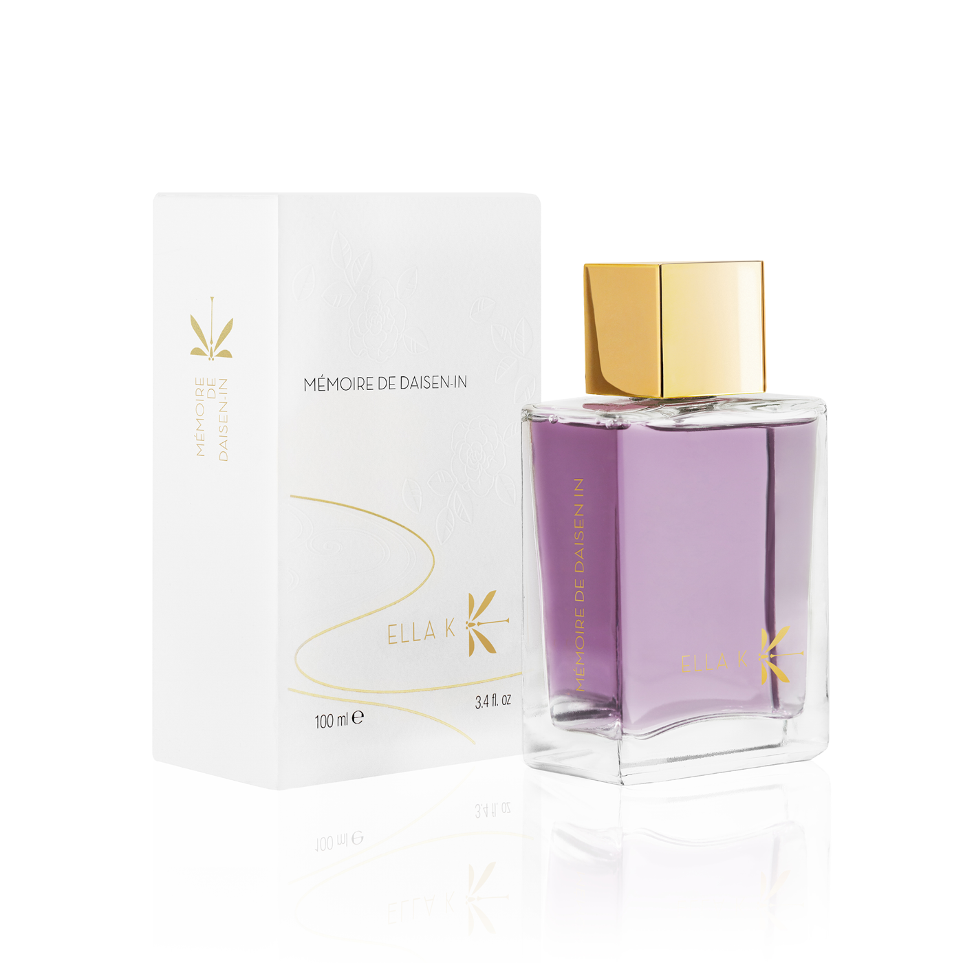Flacon de parfum Mémoire de Daisen In d’Ella K avec capuchon doré, présenté à côté de son étui illustré blanc.