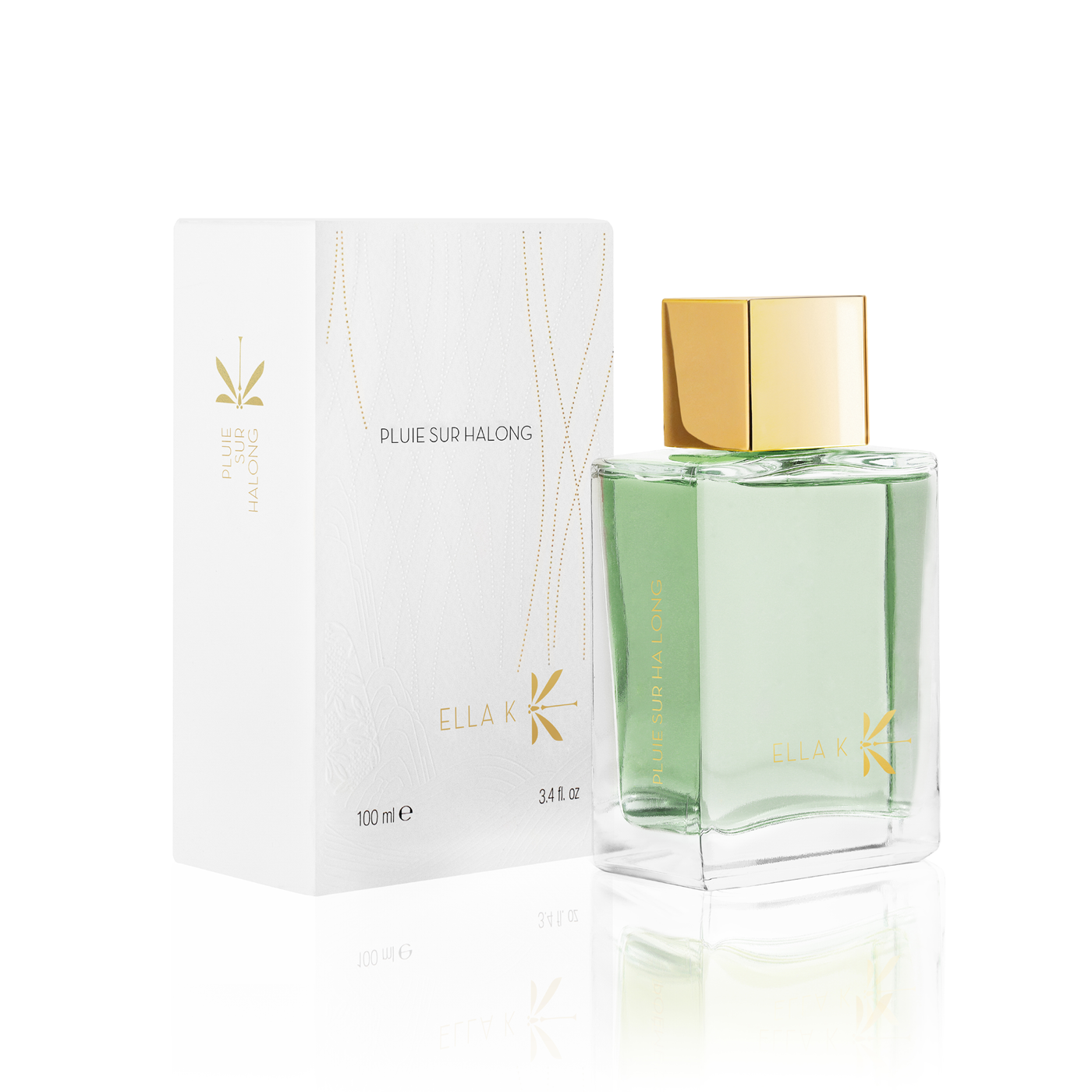 Flacon de parfum Pluie sur Ha Long d’Ella K avec capuchon doré, présenté à côté de son étui illustré blanc.
